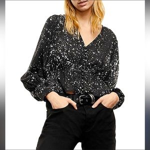 Peplum hem puffed sleeve v-neck top